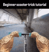 a person is riding a razor scooter down a hallway
