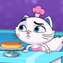 a cartoon cat with a donut on her head looks at a cake
