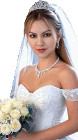 the bride is wearing a tiara and necklace and holding a bouquet of white roses