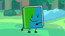 a green and blue book with arms and legs is standing in the grass