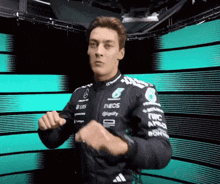 a man in a mercedes jacket is dancing