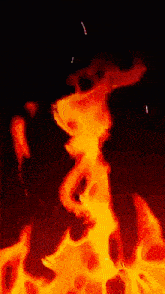 a painting of a fire with sparks flying out of it