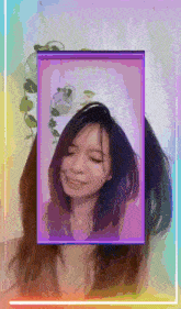 a picture of a woman with a purple frame around her head
