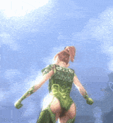 a woman in a green outfit has the letter g on the back