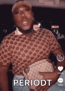 a man wearing a gucci shirt is holding a purse and says periodt on the bottom