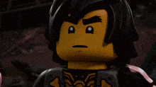 a close up of a lego figure with a serious look on his face