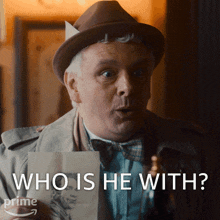 Who Is He With Aziraphale GIF - Who Is He With Aziraphale Michael Sheen GIFs