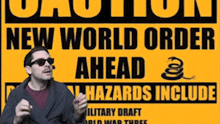 a man is standing in front of a yellow sign that says new world order ahead