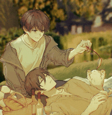 a couple of anime characters laying on a blanket with a cat