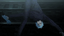 a person with white hair is standing in a dark room .