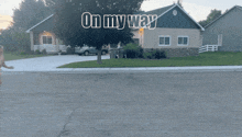 a picture of a house with the words on my way on it