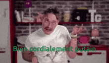a blurry picture of a man with the words bien cordialement putain written in green