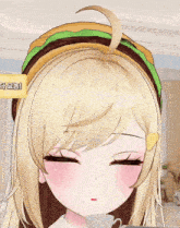 a close up of a girl with a hamburger headband