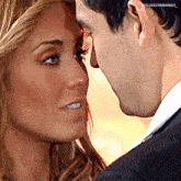 a man and a woman are touching their foreheads with the caption colucciyarango_