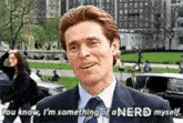 a man in a suit and tie is saying `` you know , i 'm something of a nerd myself . ``