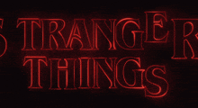 a red sign that says stranger things 3 on a black background