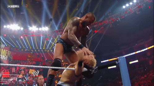 randy-orton-punches-in-corner