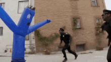 police wacky waving inflatable tube man tube man inflatable riot