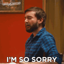 a man says i 'm so sorry with his hands up