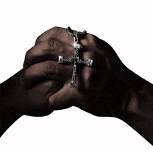 hands with a cross vin diesel dominic toretto praying cross necklace