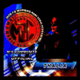 a woman is standing in front of a m2c community official logo
