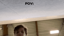 a man is doing a trick on a balance beam with the words pov written above him .