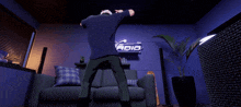 a person dancing in a room with a sign that says 10