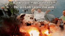 a man is sitting on a couch in front of an explosion with the words marked one what the hell