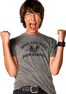 a boy wearing a rock and roll high school t-shirt