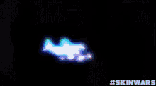 a black background with a blue glowing object in the middle