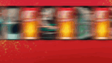 a red background with a blurred image of a row of jars .