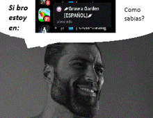 a man with a beard is smiling in front of a screen that says grow a garden in spanish