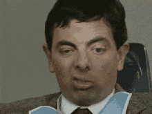 Mr Bean Weird Faces GIF