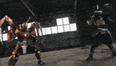 two ninjas are fighting in a warehouse and the tv says tv asahi on the bottom