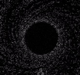 a silhouette of a person standing in the middle of a vortex