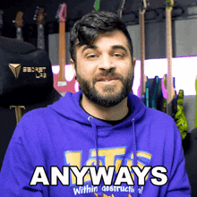 a man wearing a purple hoodie says anyways