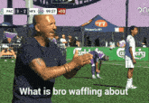 a man stands on a soccer field with the words what is bro waffling about below him