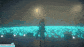 a girl in a white dress is standing in a field of blue light
