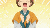 a girl with a flower in her hair is laughing with her mouth open