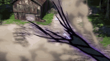 a rusty building with a purple smoke coming out of it in front of a dirt road
