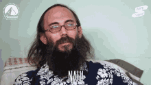a man with a beard and glasses is wearing a shirt that says nah