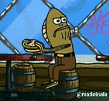 a cartoon character from spongebob squarepants is sitting on a barrel holding a pie .