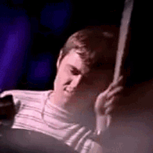 Playing Drums Tony Mccarroll GIF - Playing Drums Tony Mccarroll Oasis GIFs