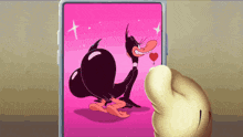 a hand is pointing at a picture of daffy duck on a phone