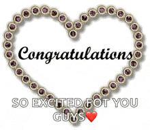 a heart made of purple stones with the words `` congratulations so excited for you guys '' written on it .