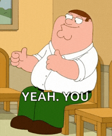 peter griffin is giving a thumbs up while sitting in a chair .