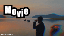 a man is looking out over a lake with the word movie above him