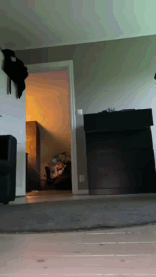 a living room with a couch and a dresser