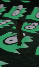 a statue of bart simpson is standing in front of a green background with the number 8 on it