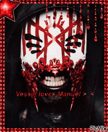 a picture of a man with red and white paint on his face with the caption vessel loves manuel